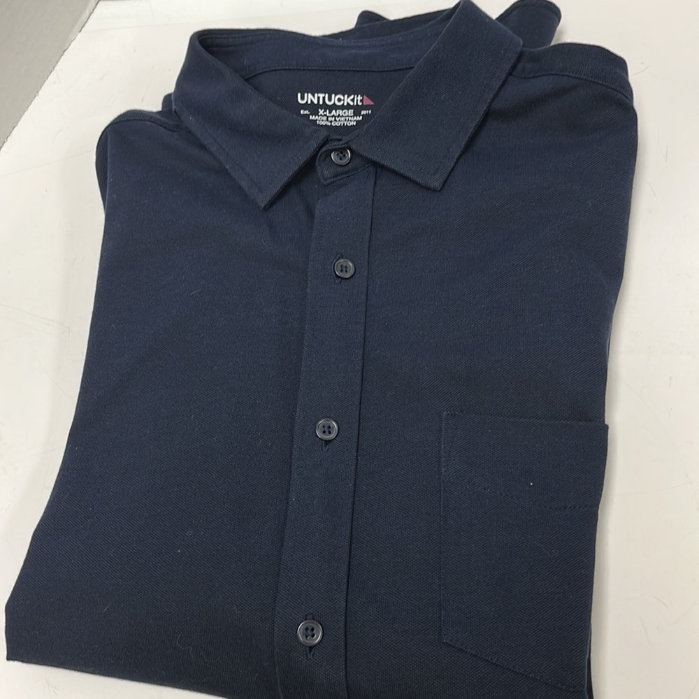 UNTUCKit blue shirt.